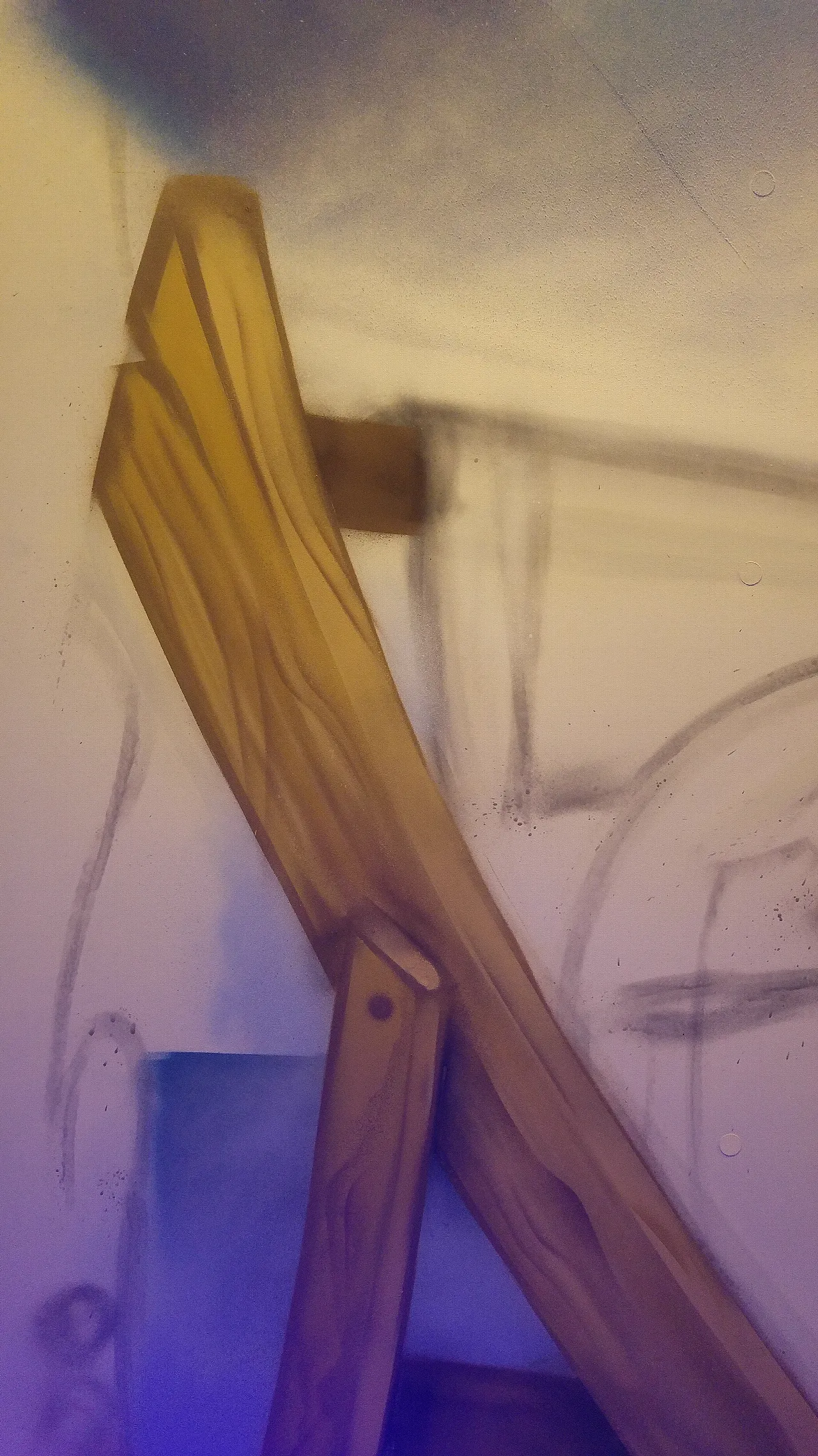 wood grain pattern created with spray paint.